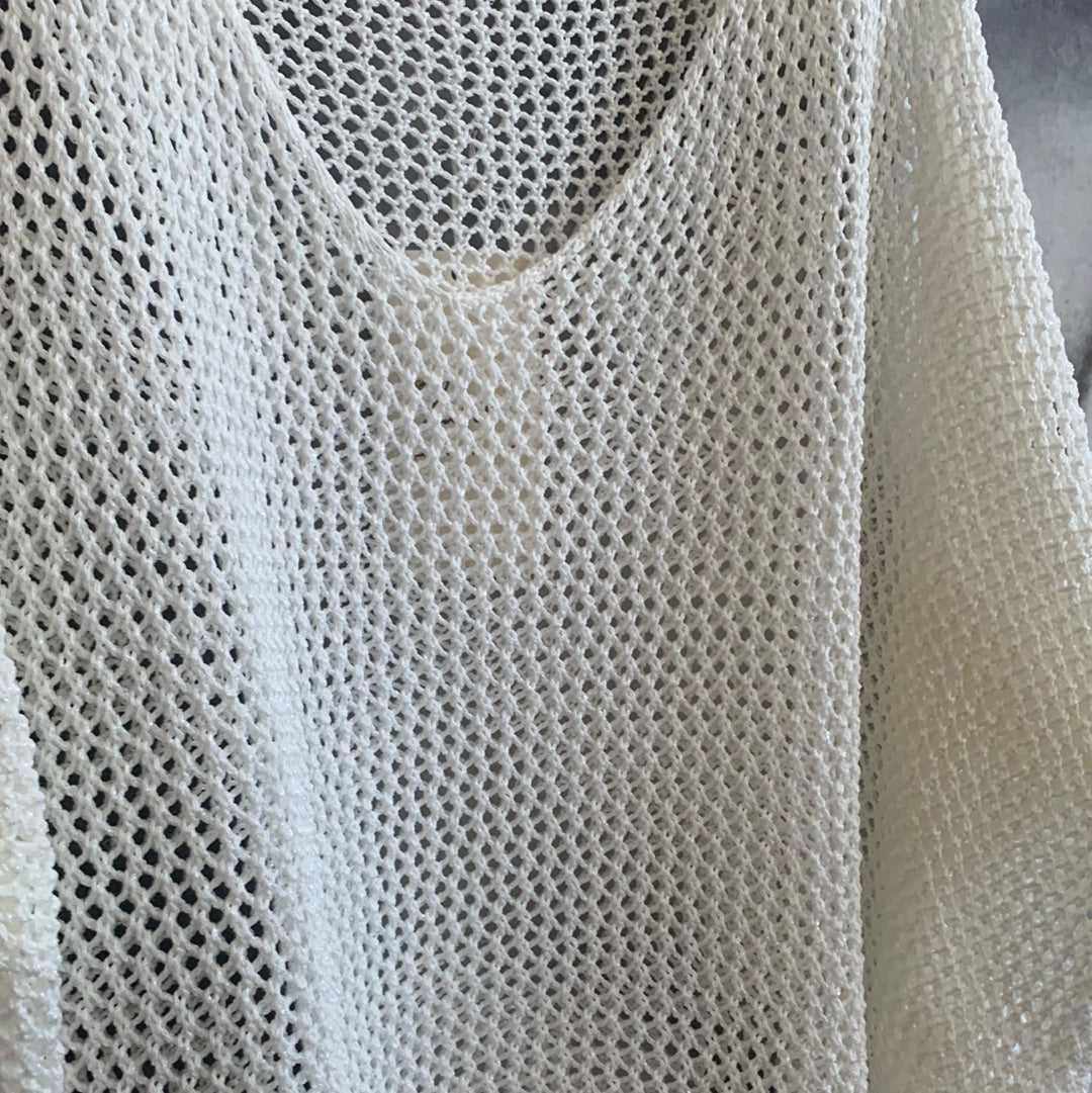 Strickpulli mit Lochmuster
