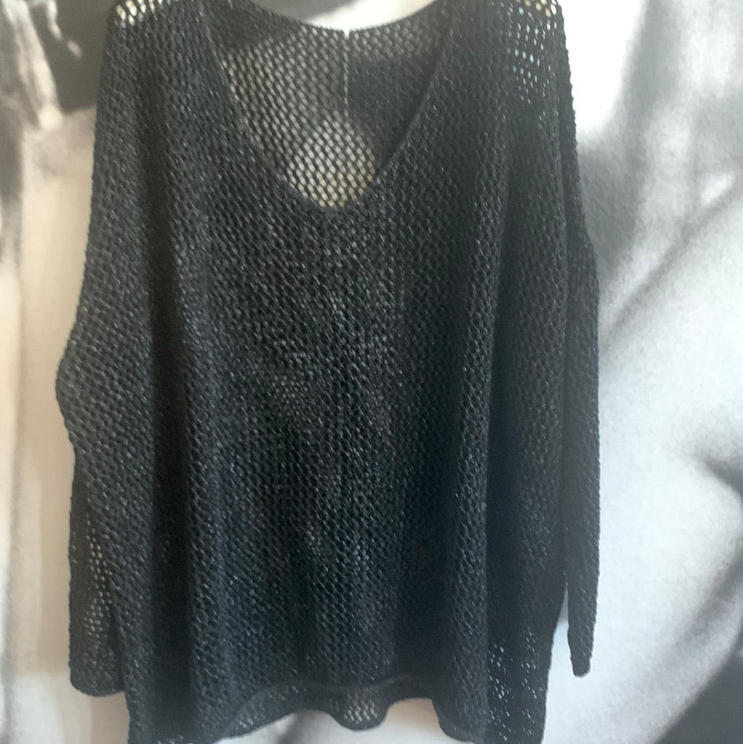 Strickpulli mit Lochmuster