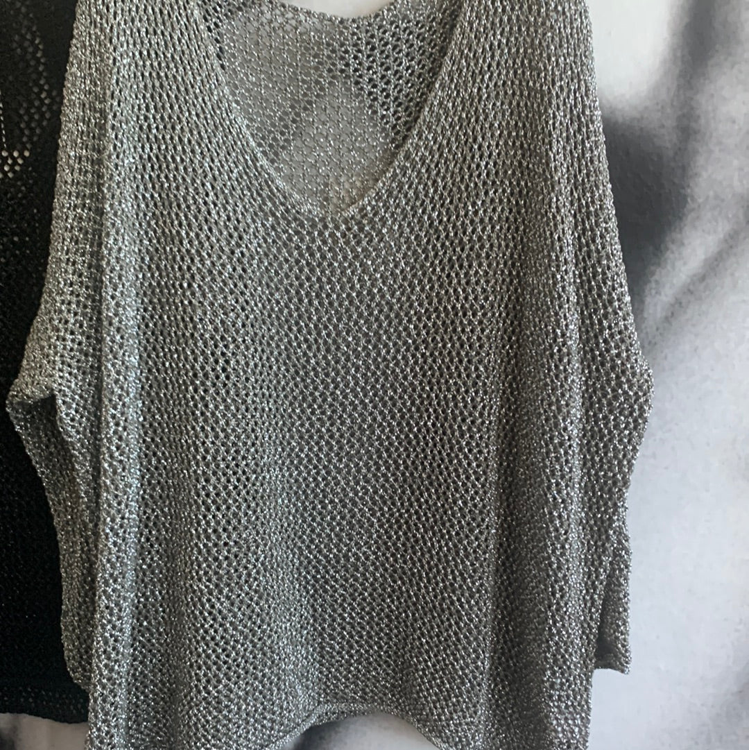 Strickpulli mit Lochmuster