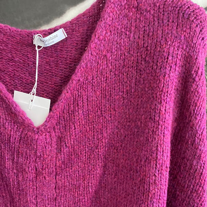 Strickpulli mit Bändchen