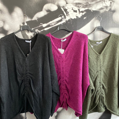 Strickpulli mit Bändchen