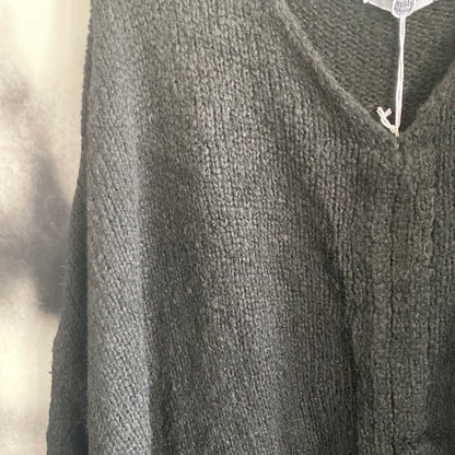 Strickpulli mit Bändchen